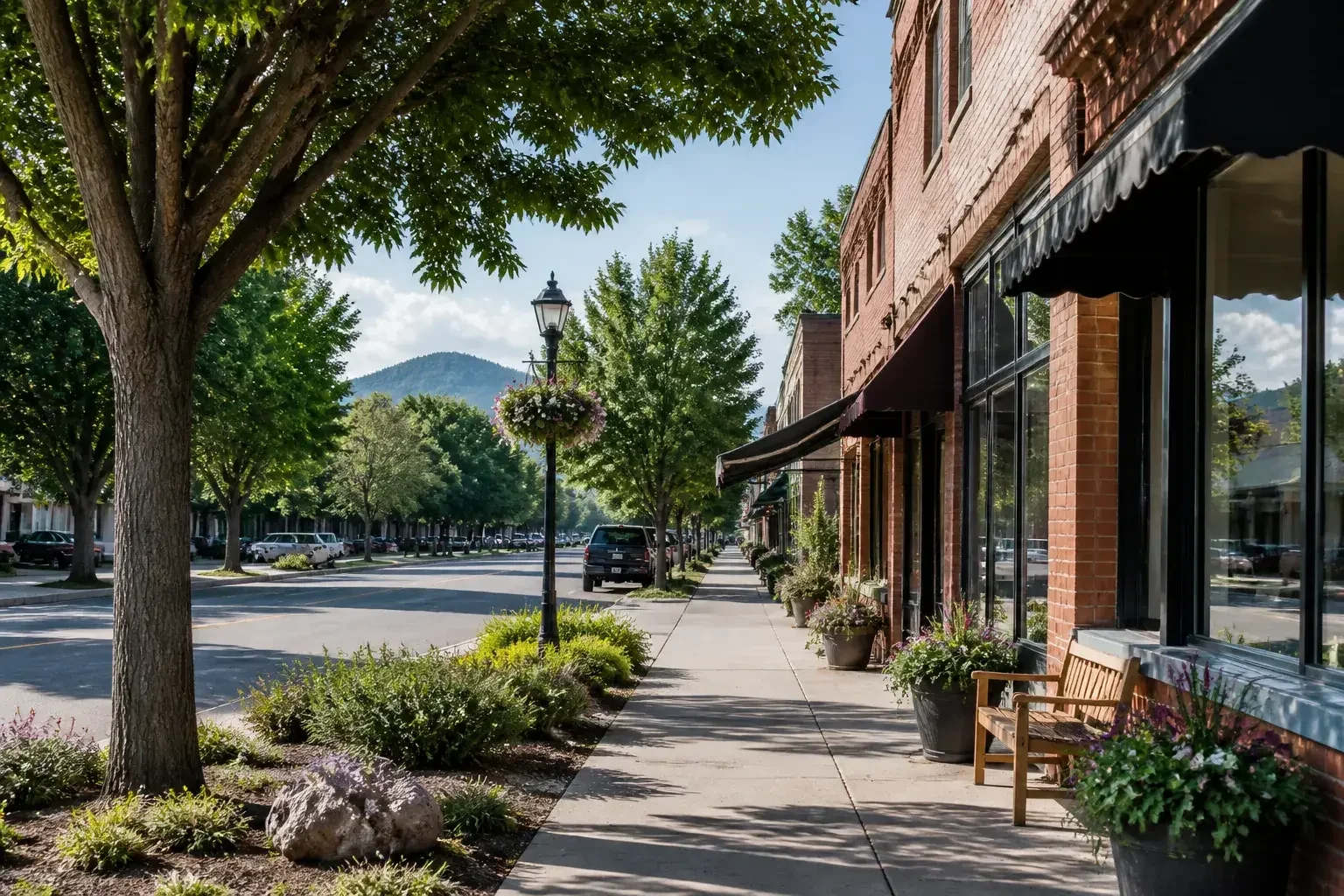 Quiet Niwot village street with brick storefronts